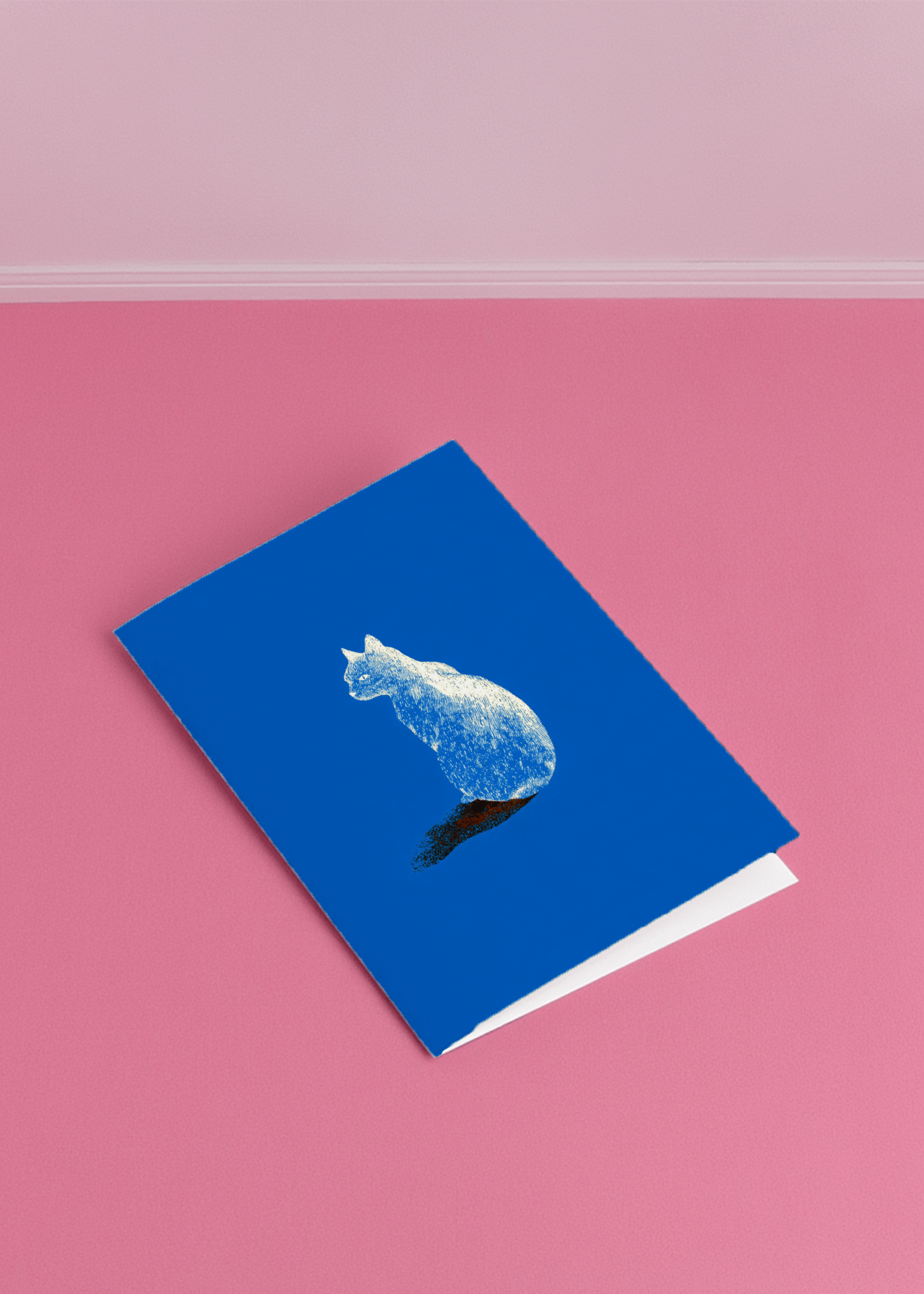 white cat sitting solemnly mockup 1