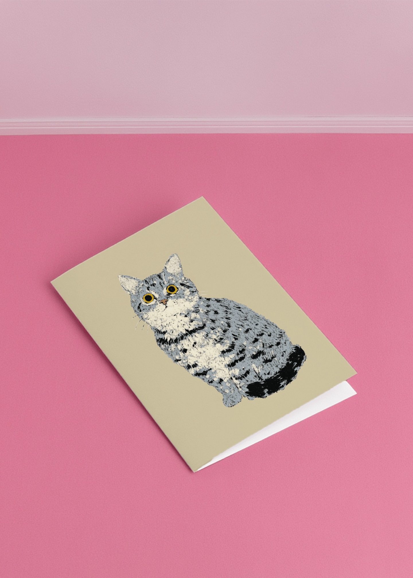 grey tabby cat sitting mockup 1